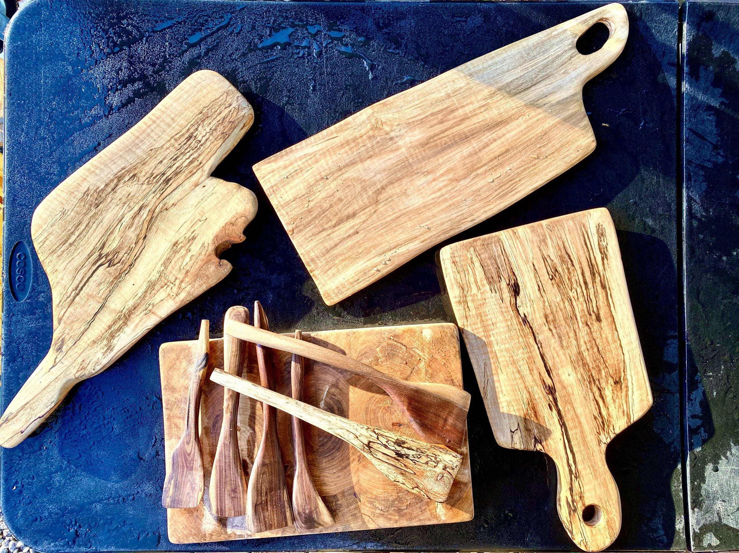 Cutting boards and hand-carved spoons and spreaders
