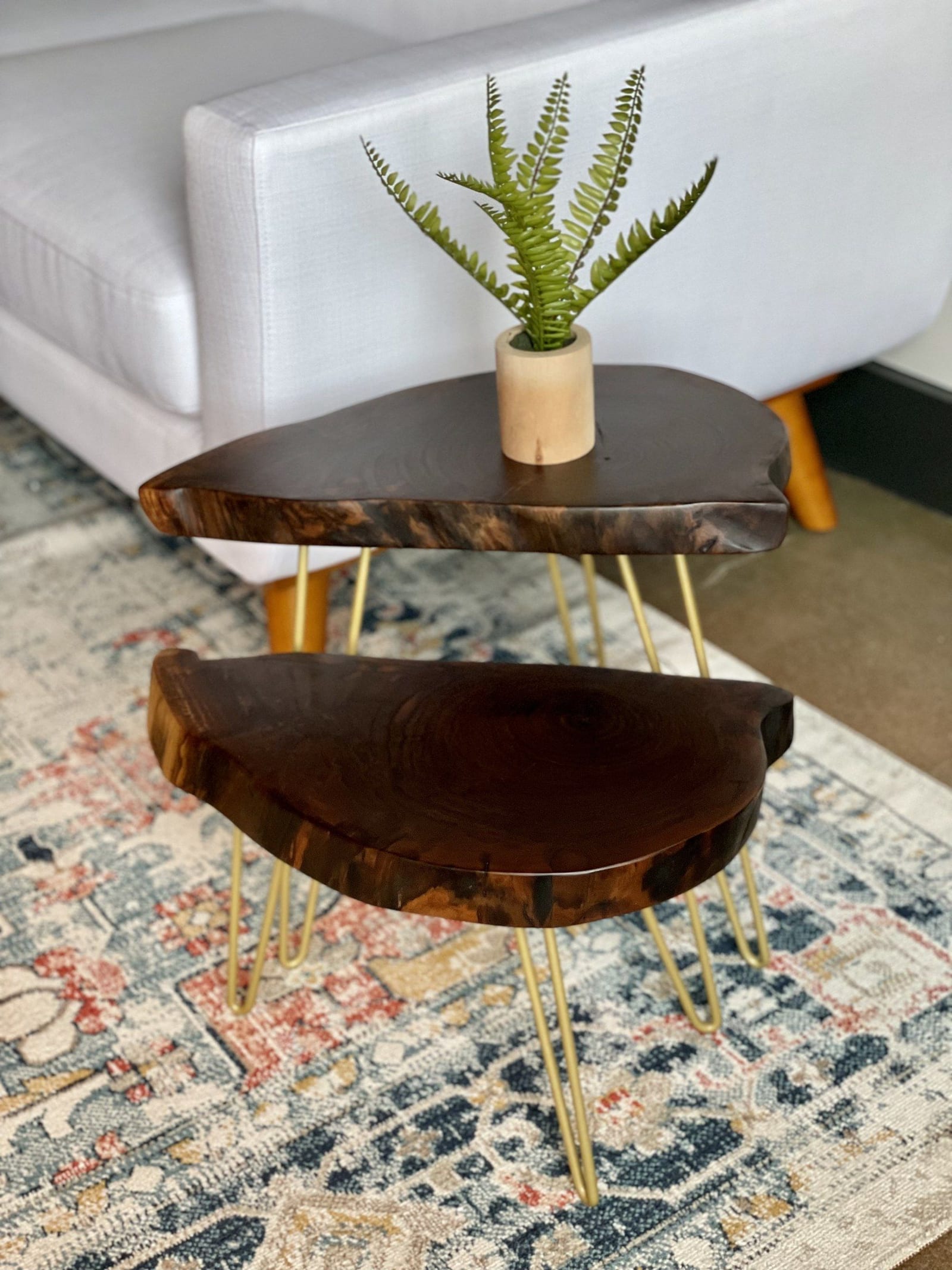 Nesting live-edge tables with gold hairpin legs