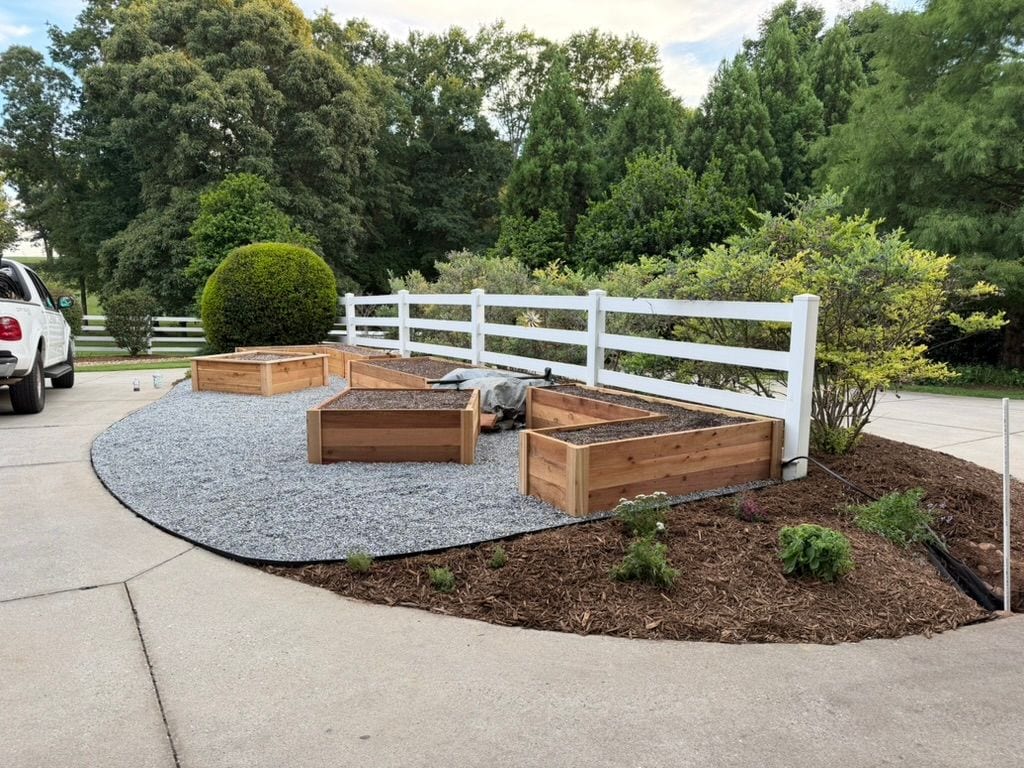 The finished beds in daylight, gravel apron complete